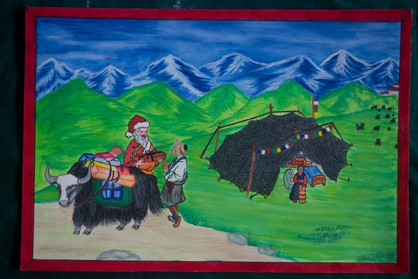 Santa's Yak - Santa has traded his reindeer for a yak to deliver prsents to nomads in this colourful image. By Tashi Sangpo
